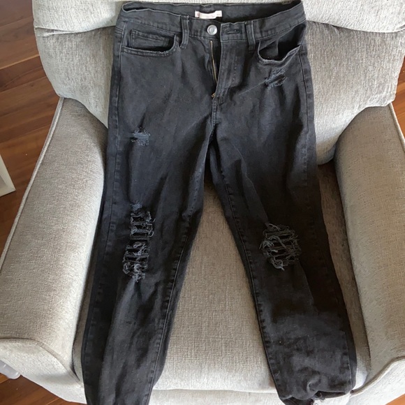 Black mom-jeans from So. Rips at the knees, high-rise, and high ankles. - Picture 1 of 1